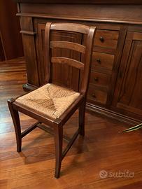 Sedie in legno e seduta in paglia