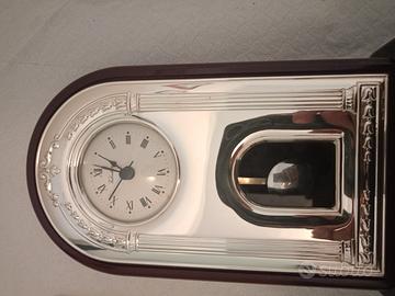 orologio da appoggio,in argento.