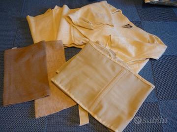 Ginocchiere, maniche, cinture.