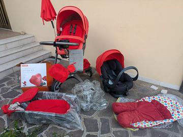 passeggino stokke rosso