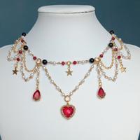 Collana oro, rossa e nera