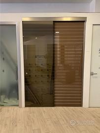 Porta Scorrevole doppia in vetro esterno muro