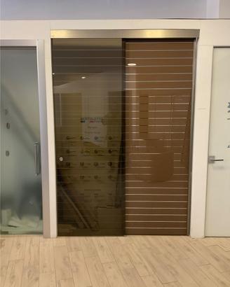 Porta Scorrevole doppia in vetro esterno muro