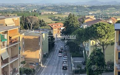 Quadrilocale panoramico con garage in zona servita