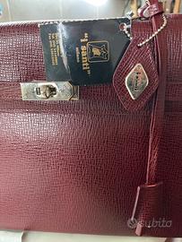 I Santi borsa modello Birkin