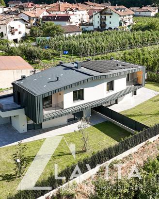 Nuova villa a schiera con giardino a Salorno
