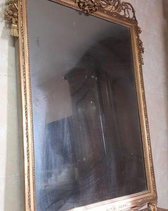 Specchiera antica in legno dorato a  foglia d' oro