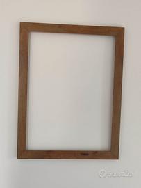 Cornice in legno massello di olivo