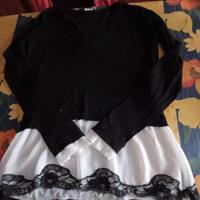 Maglia nera con volants bianchi 