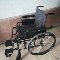 Carrozzina pieghevole ad autospinta