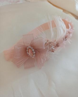 Fascia neonata con fiore  e fiocchi 