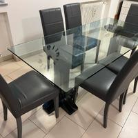 Tavolo con piedi in marmo