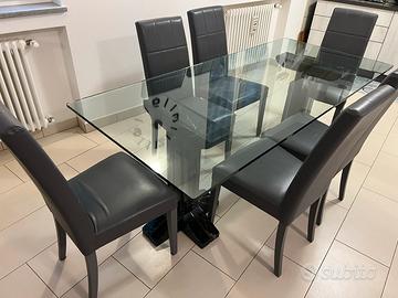 Tavolo con piedi in marmo