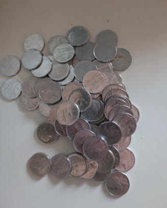 lotto 1 kg monete tutte da 100 lire  per jukebox 