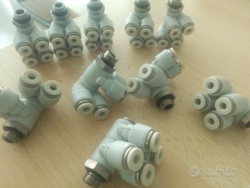 raccordo quadruplo 1/8 tubo 4