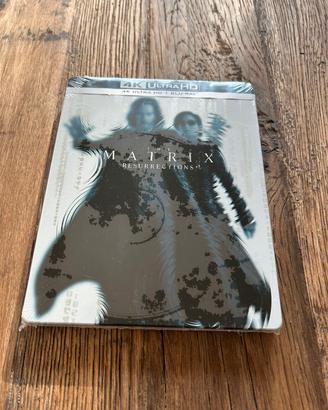 confezione DVD del film The Matrix Resurrections.
