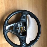 Volante Opel astra con comandi