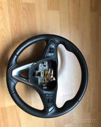 Volante Opel astra con comandi