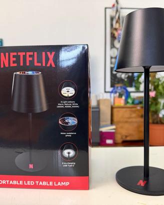 Lampada da tavolo LED portatile con logo Netflix