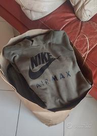 Busta  piena di abbigliamento di marca 10-13