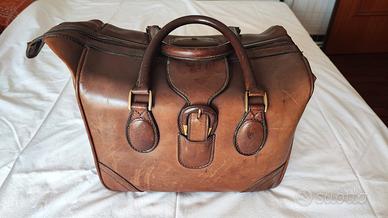 Valigia vintage borsone in cuoio.