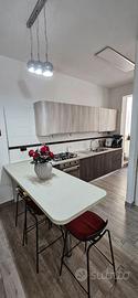 Cucina Stosa moderna bicolore con penisola + forno
