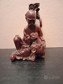 Coppia di statuine orientali in legno