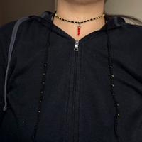 Collana choker nero con corno portafortuna uncinet