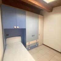 camera da letto singola per ragazzi con materasso