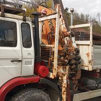 Macchina operatrice Man Meccanica 4x4 con gru