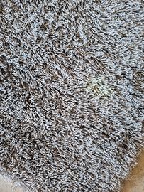 Tappeto pelo lungo grigio