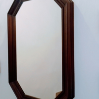 Specchio con cornice in legno