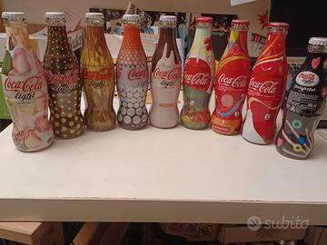 9 bottiglie di coca cola da colezzione
