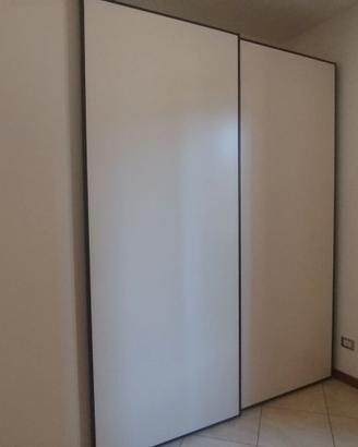 Camera da letto matrimoniale marrone scuro