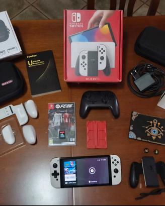 Nintendo Switch OLED+MK8 +FC26+Joystick+Accessori