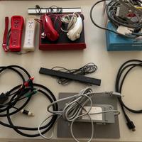 Nintendo Wii Mini Rossa + 2 Nunchuck + 5 giochi