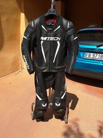 tuta moto 48 divisibile come NUOVA!!