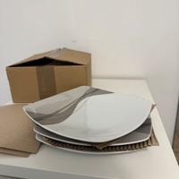 Set di tre piatti Guzzini