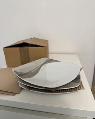 Set di tre piatti Guzzini