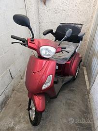 Carrozzina elettrica per uso esterno