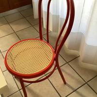 4 sedie rosse con coprisedia