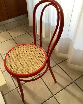 4 sedie rosse con coprisedia