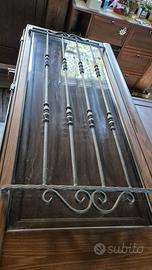 Porta in legno massiccio con inferriata artigianal