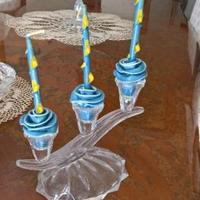 Candelabro in vetro con candele