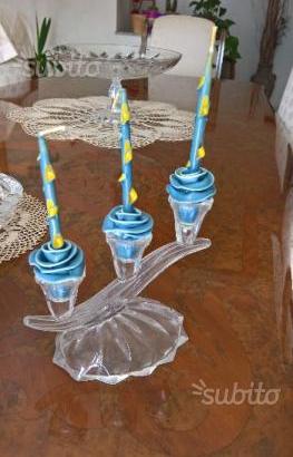 Candelabro in vetro con candele