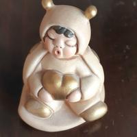 Statuina bimbo coccinella Thun color avorio