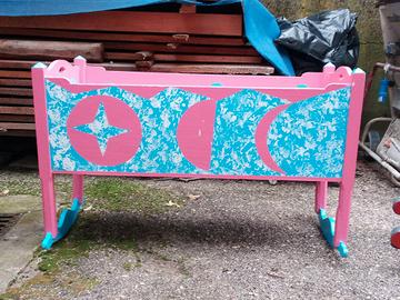 Culla legno rosa/azzurra.
