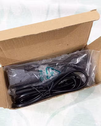 ALIMENTATORE  COMPATIBILE PER FOTOCAMERE  CANON