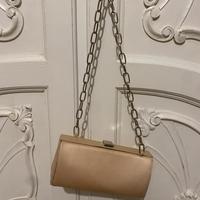 Pochette vintage versus versace