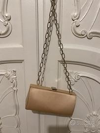 Pochette vintage versus versace